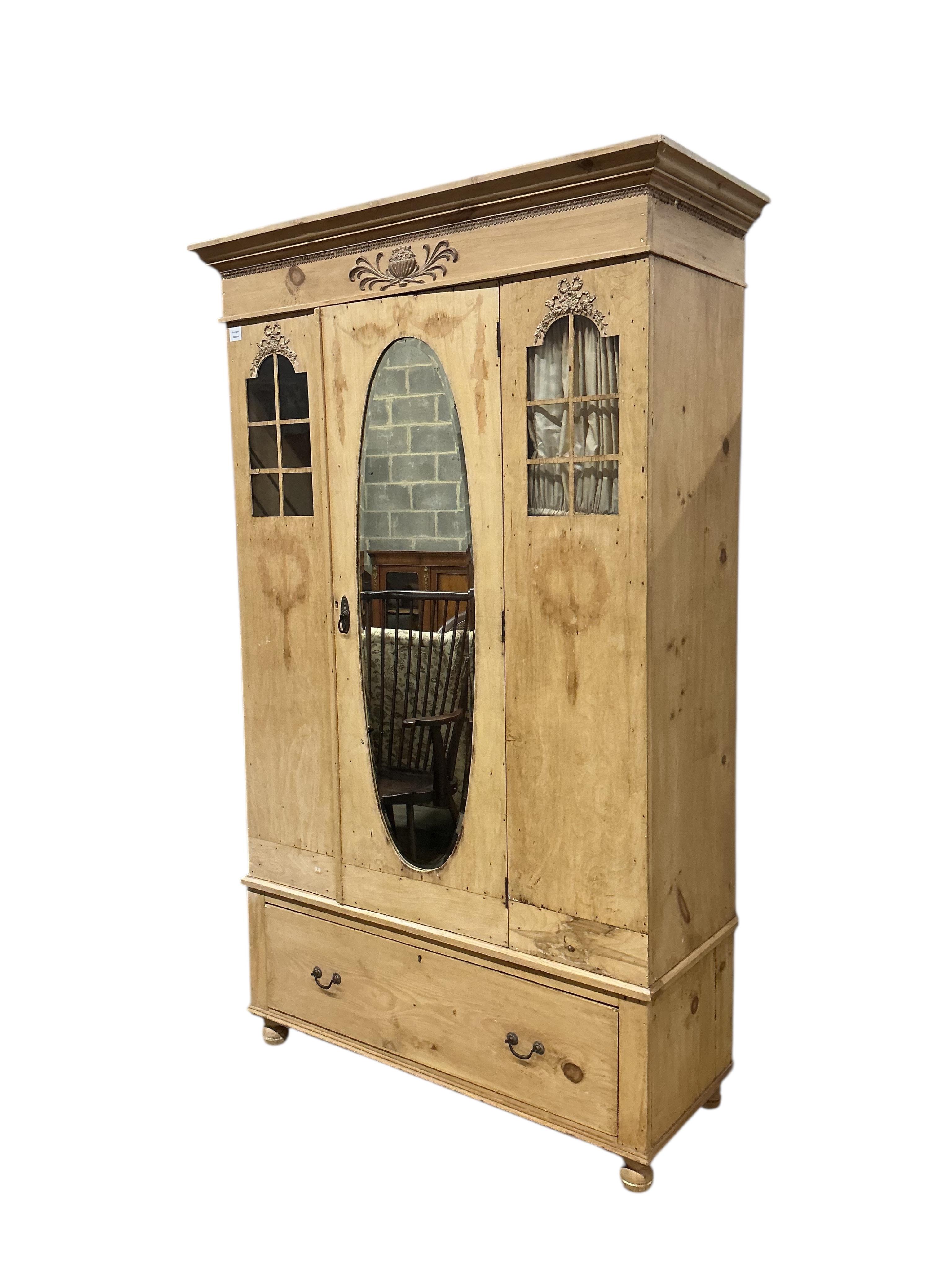 A late 19th century Continental pine wardrobe, width 124cm, depth 51cm, height 200cm